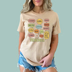 Tan-colored multicultural teacher graphic tee, perfect for bilingual and international educators.
