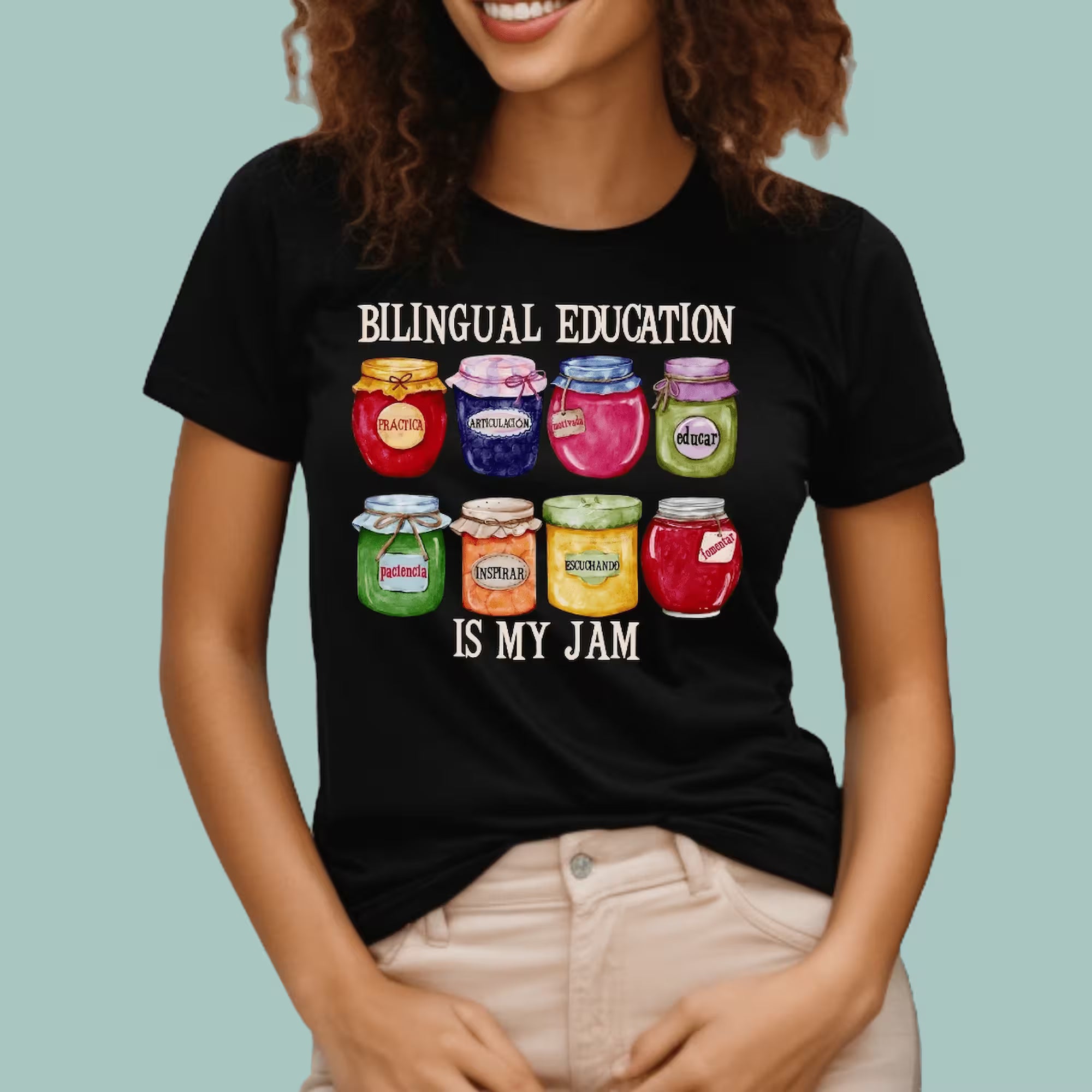 Black dual language teacher shirt with a colorful 'Bilingual Education Is My Jam' graphic.