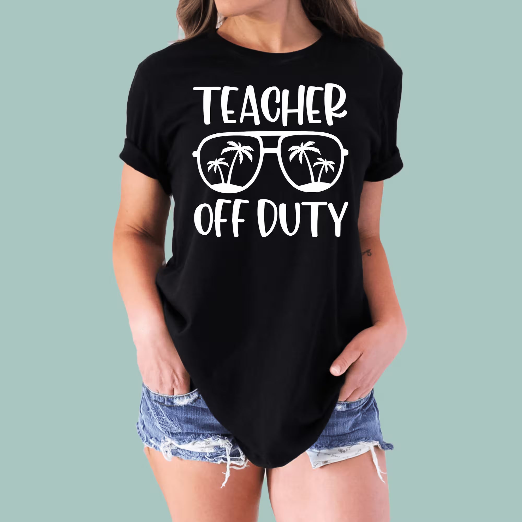 Black educator summer gift shirt with "Teacher Vacation Mode" typography for end-of-year celebrations.