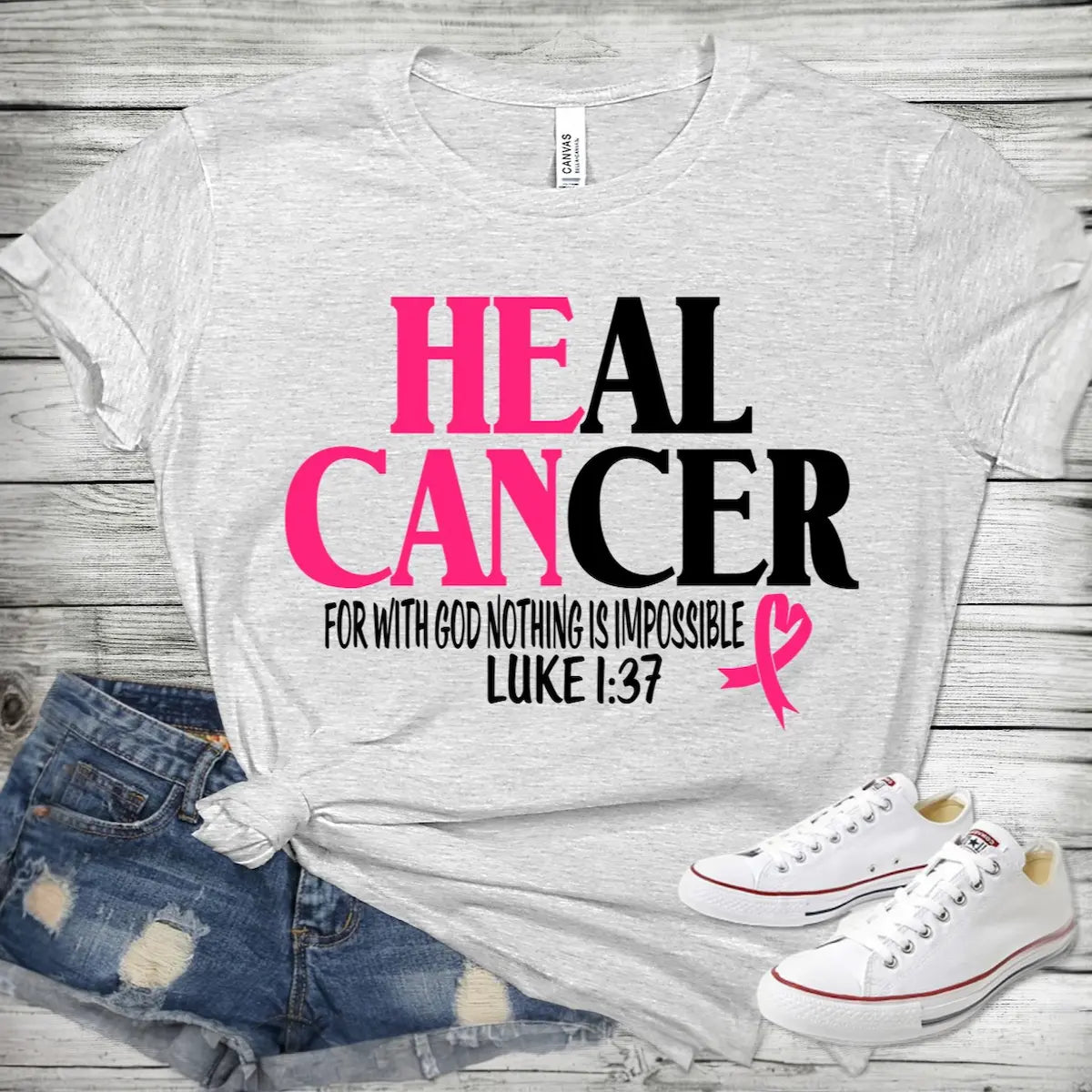 Close-up of the 'With God Nothing is Impossible' graphic design for cancer awareness.