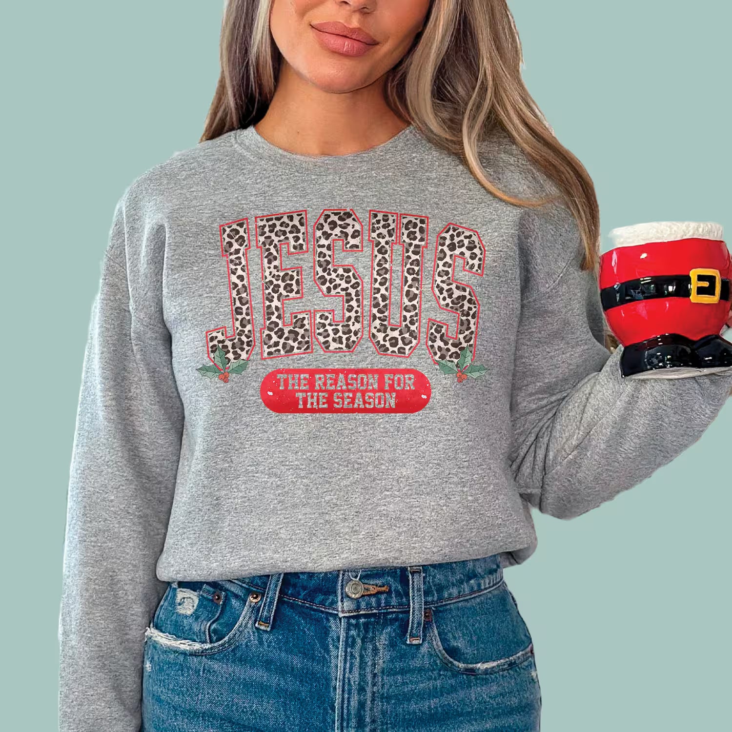 Grey Christian Christmas sweatshirt for men and women, festive leopard print Jesus design.