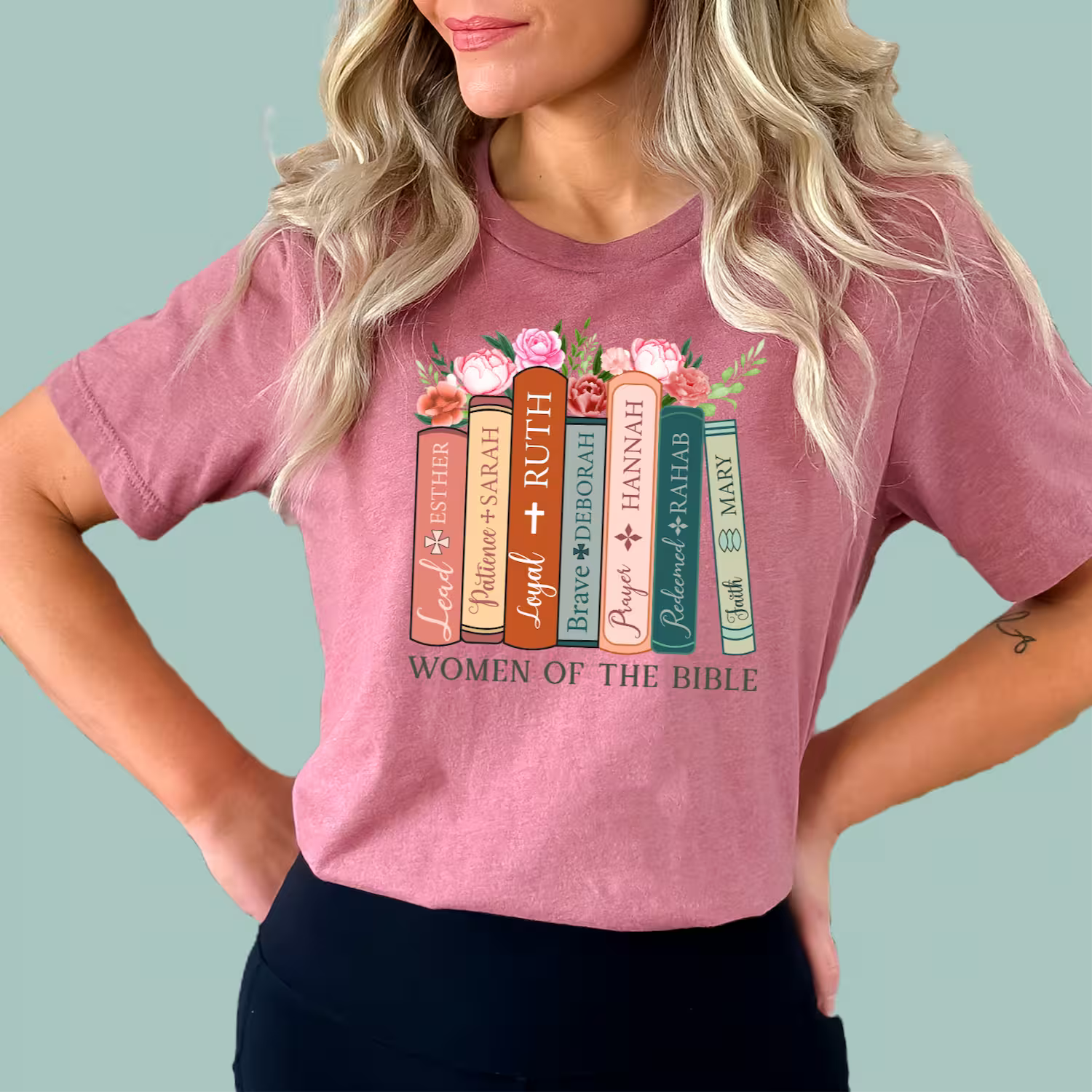Heather-Mauve-graphic tee with a modern book-stack design honoring Deborah, Sarah, and Esther.