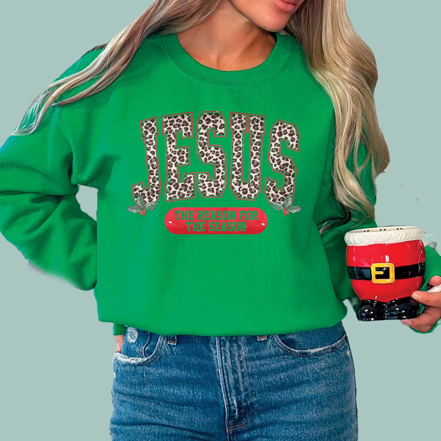 Festive Kelly Green "Jesus The Reason For The Season" pullover, perfect for holiday church events.