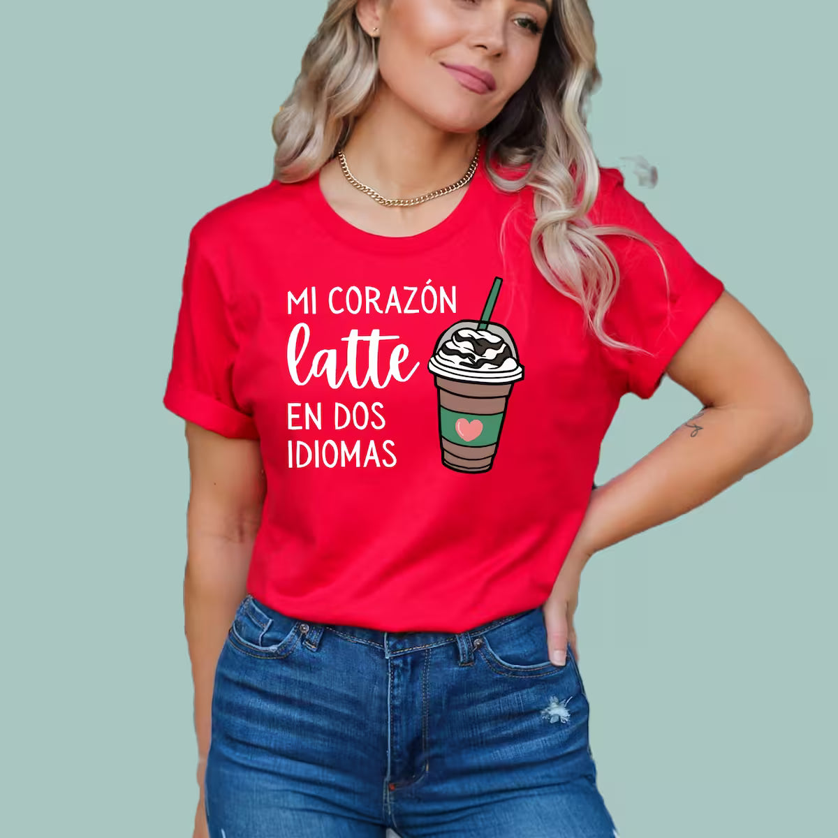 Red teacher appreciation gift shirt with "My Heart Beats in Two Languages" Spanish typography.