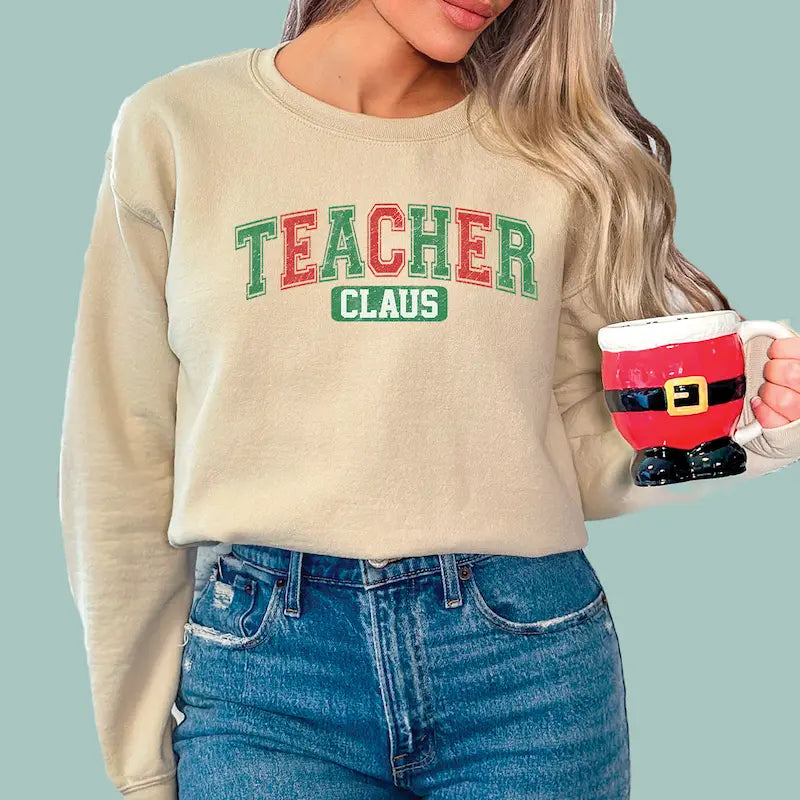 Tan-colored Teacher Claus Christmas pullover, a cozy and stylish gift for teachers.