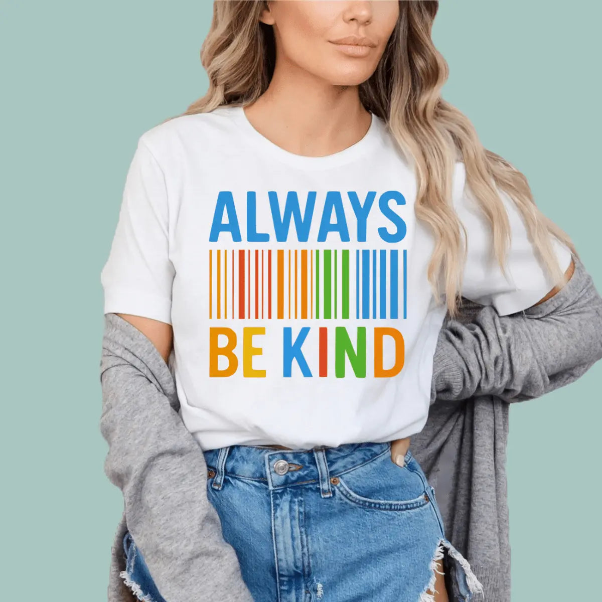 White minimalist cotton tee with "Always Be Kind" message, comfortable and stylish for daily wear.