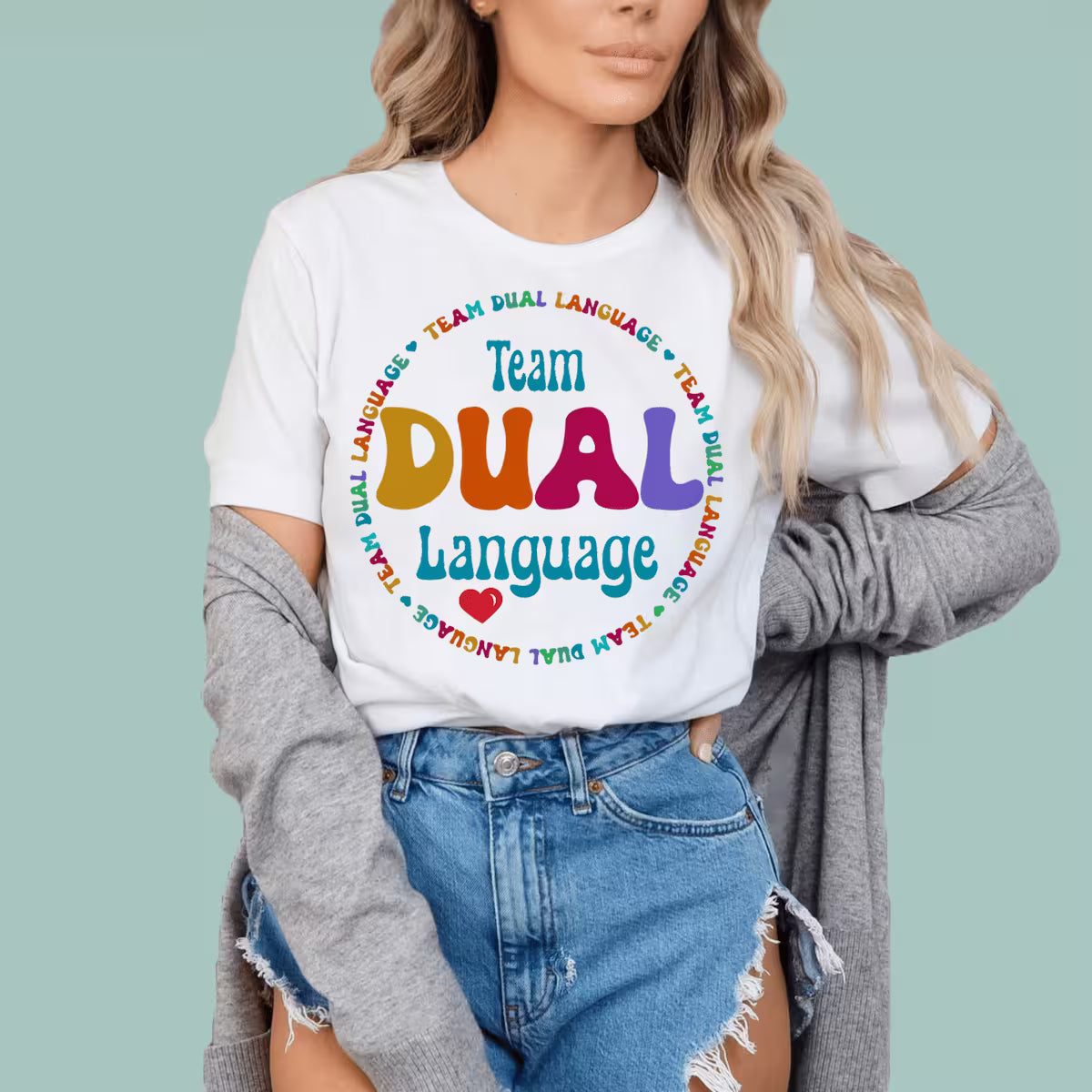 White teacher appreciation tee with a bold "Team Dual Language" speech bubble design by Alexander Crafts.